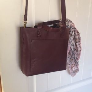 Madewell burgundy small transport bag.